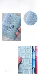 Macro shot of light blue crocodile texture and metal buckle on women's PU leather wallet