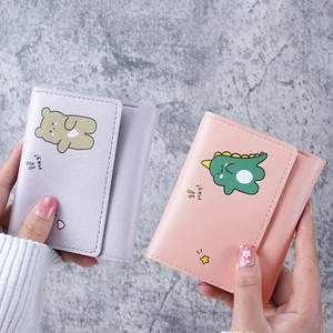 Short tri-fold women's wallet with cute cartoon bear and dinosaur prints on textured PU leather