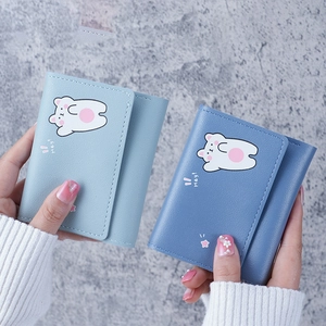 Minimalist tri-fold women's wallet with cute cartoon bear print in light blue and grey