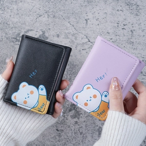 Compact tri-fold PU leather wallets for women featuring cute bear print in black and purple