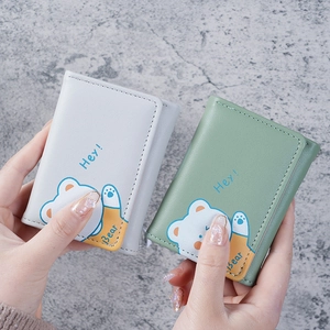 Three-fold PU leather mini wallet for women featuring a cute cartoon bear illustration