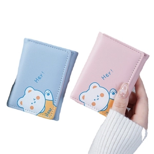 Cute tri-fold mini wallet for women featuring cartoon bear prints in pink and blue colors