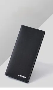 Close-up of long black men's wallet featuring a carbon fiber texture and refined stitching