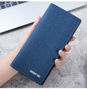 Close-up of slim navy blue long wallet featuring innerSoi logo and textured canvas