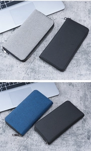 Collection of men's canvas long zipper wallets in black, navy blue and light grey colors
