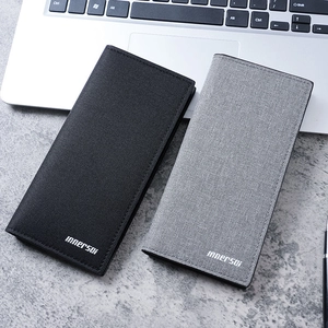 Long slim bifold wallets for men in black and grey textured fabric on a business desk