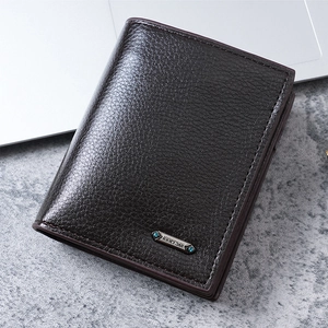 Close-up of textured brown PU leather men's wallet with neat stitching and logo