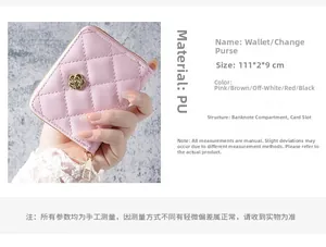Pink quilted PU leather wallet with gold camellia clasp shown in hand for size