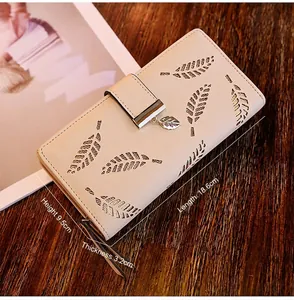 Detail view of beige PU leather wallet with hollow leaf design and 18.6x9.5x3.2cm dimensions
