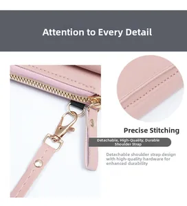 Detail of pink crossbody bag showing gold zipper, precise stitching, and detachable strap