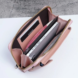 Pink leather crossbody phone wallet with metal zipper and multi-layer internal card slots