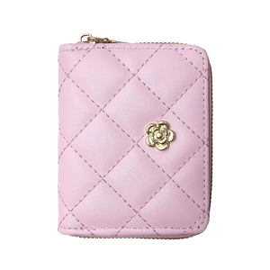 Pink quilted leather wristlet wallet with gold flower accent and zipper closure