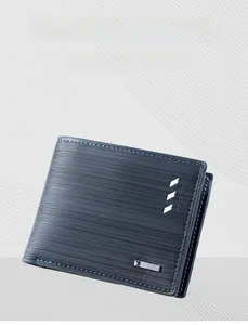 Detailed side view of navy blue bifold wallet with horizontal texture and stitching