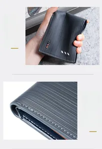 Detail of durable oil-edge finishing and fine stitching on blue men's wallet