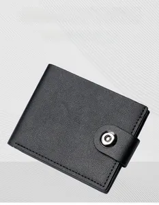 Close-up of black litchi grain leather men's short wallet with snap button closure
