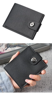 Close-up of black litchi texture leather wallet with secure metal snap button closure