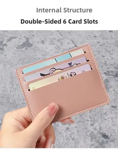 Detail view of pink lychee leather card holder showing internal 6-slot dual-side structure