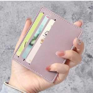 Close-up of lavender PU leather slim card holder with three slots and durable stitching