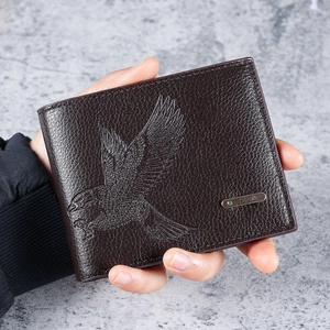 Brown leather men wallet with eagle embossed pattern and metal badge in horizontal style