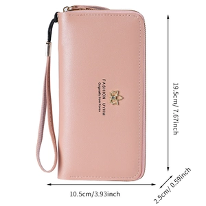 Portefeuille long rose en similicuir avec boucle papillon et dragonne et ses dimensions