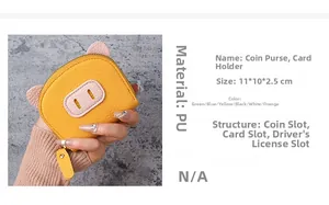 Detailed view of yellow pig-shaped PU leather card wallet with dimensions 11x10x2.5cm