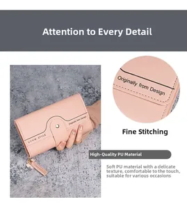 Detail view of pink PU leather wallet with fine stitching and clover tassel zipper