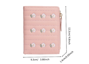 Pink bifold wallet with daisy embroidery showing dimensions 12.2cm height and 9.3cm width