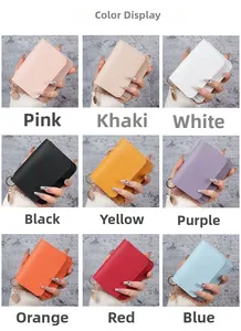 Nine colors of leather card holders shown in a grid with metal charms and keychains