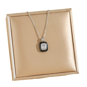 Chic silver titanium necklace with black enamel pendant and rectangular zircon on silk