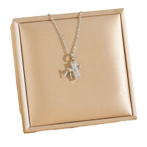 Bamboo style titanium steel necklace with sparkling crystals on silk gift box display