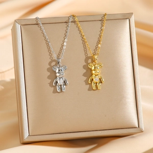 Collana orsetto in acciaio al titanio oro e argento con pietra di zirconia cubica