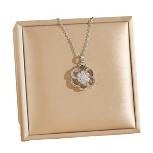 Elegant silver openwork floral pendant necklace with sparkling cubic zirconia stones