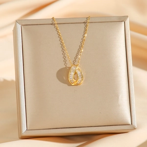 Elegant gold-plated teardrop necklace featuring micro-set rectangular zircon in a display box