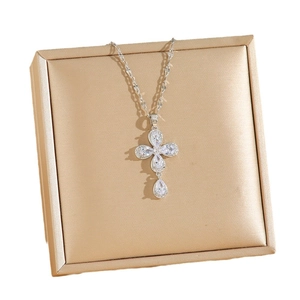 Elegant four-leaf clover cross pendant necklace with clear zircons in a gold gift box