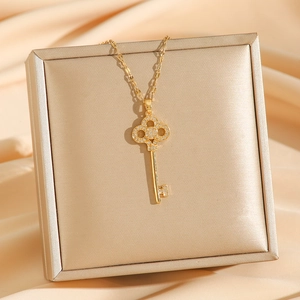 Luxurious 18K gold-plated clover key pendant necklace with sparkling micro-pave zircons