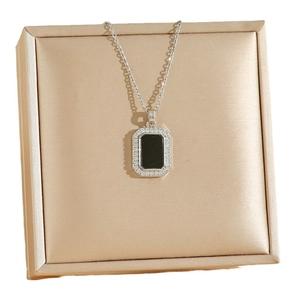 Geometric black rectangular pendant necklace with diamonds on 18K gold-plated steel