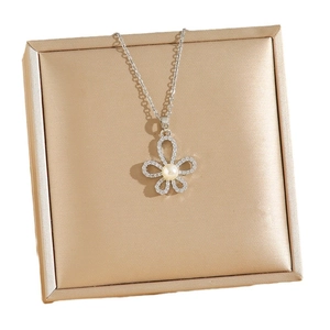 Elegant silver stainless steel flower necklace with pearl center and diamond petals