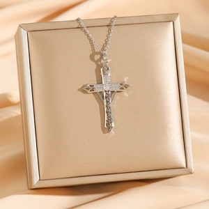 Sword cross pendant necklace with hollow engraving and sparkling stones in a gift box