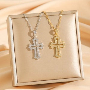 Retro cross pendant necklaces in gold and silver with zircon stones on champagne silk