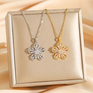 Sparkling floral zircon necklace set in gold and silver finish with baguette cut stones