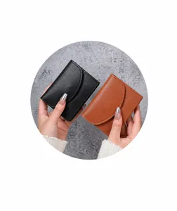 Mini PU leather card wallets in black and brown with litchi texture and minimalist design