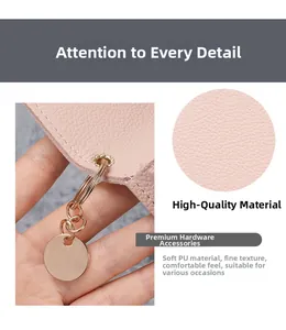 Close-up of pink PU leather texture and polished metal pendant on minimalist card holder