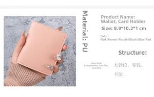 Detailed view of pink ultra-thin leather card holder with bow charm and dimensions