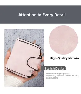 Detail of pink matte leather women's short wallet showing premium texture and snap closure