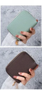 Vertical view of compact pebble leather card holders in mint green and dark brown colors
