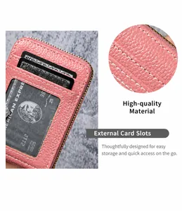 Pink leather card holder with RFID blocking, zipper closure and clear ID window view