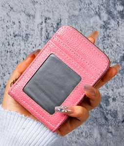 Pink lychee texture card holder with zipper closure and clear ID window for women