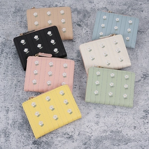 Short quilted daisy embroidery wallet set in various pastel colors with metal zipper