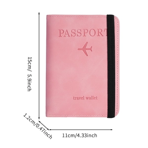 Pink PU leather passport holder with plane logo and elastic strap showing 15x11cm dimensions