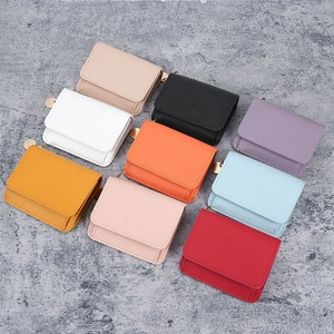 Minimalist leather card holder wallets in nine colors with lychee texture and gold charms